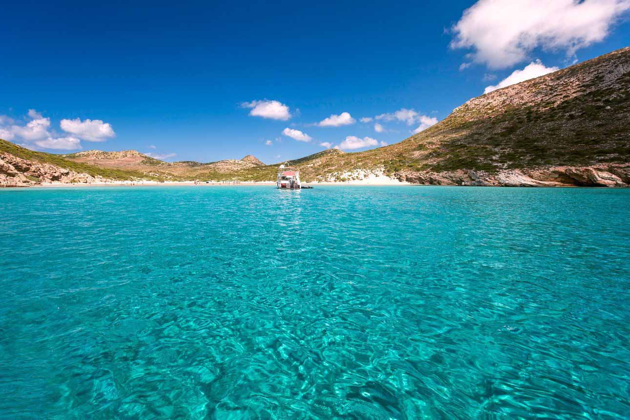 Clear transparent waters in Livadi sandy beach, Despotiko island