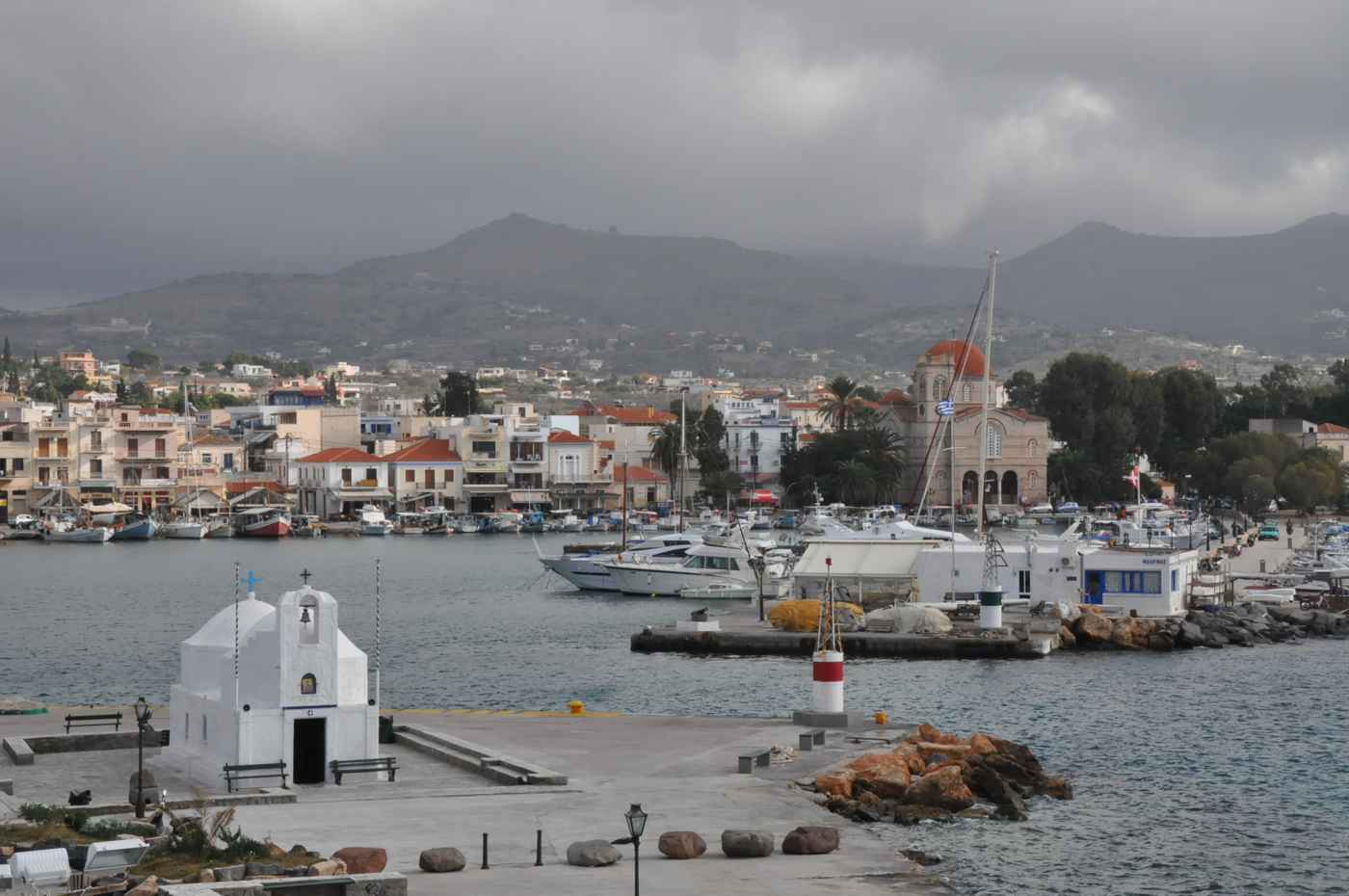 Aegina Town: the harbour waterfront with its neoclassical houses, cathedral and the chapel of Agios Nikolaos