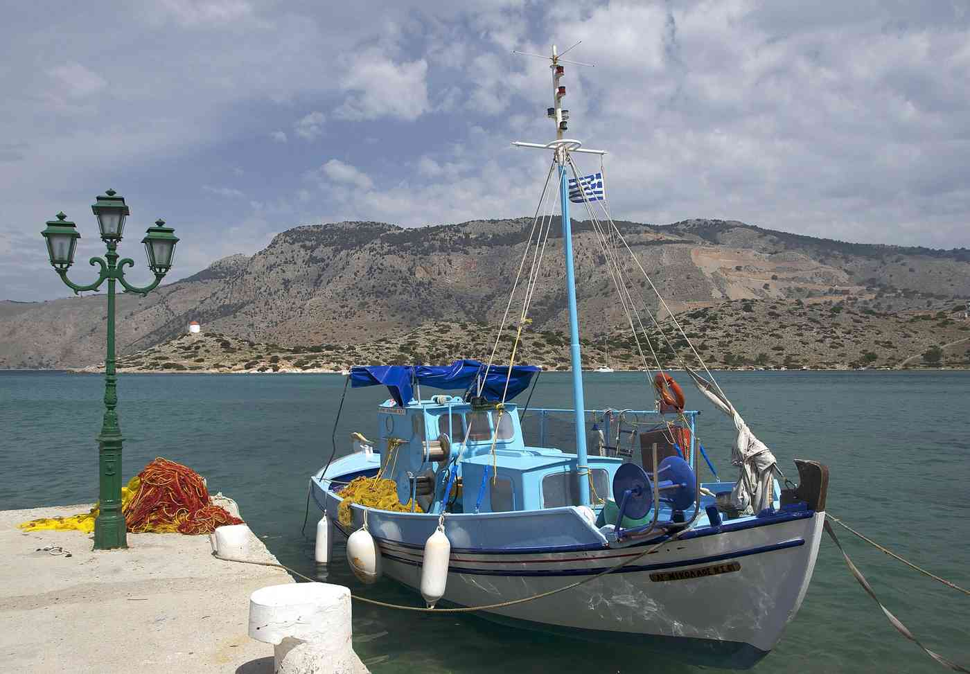 Agios Nikolaos Beach on Symi: The Sandy Family Cove near Pedi
