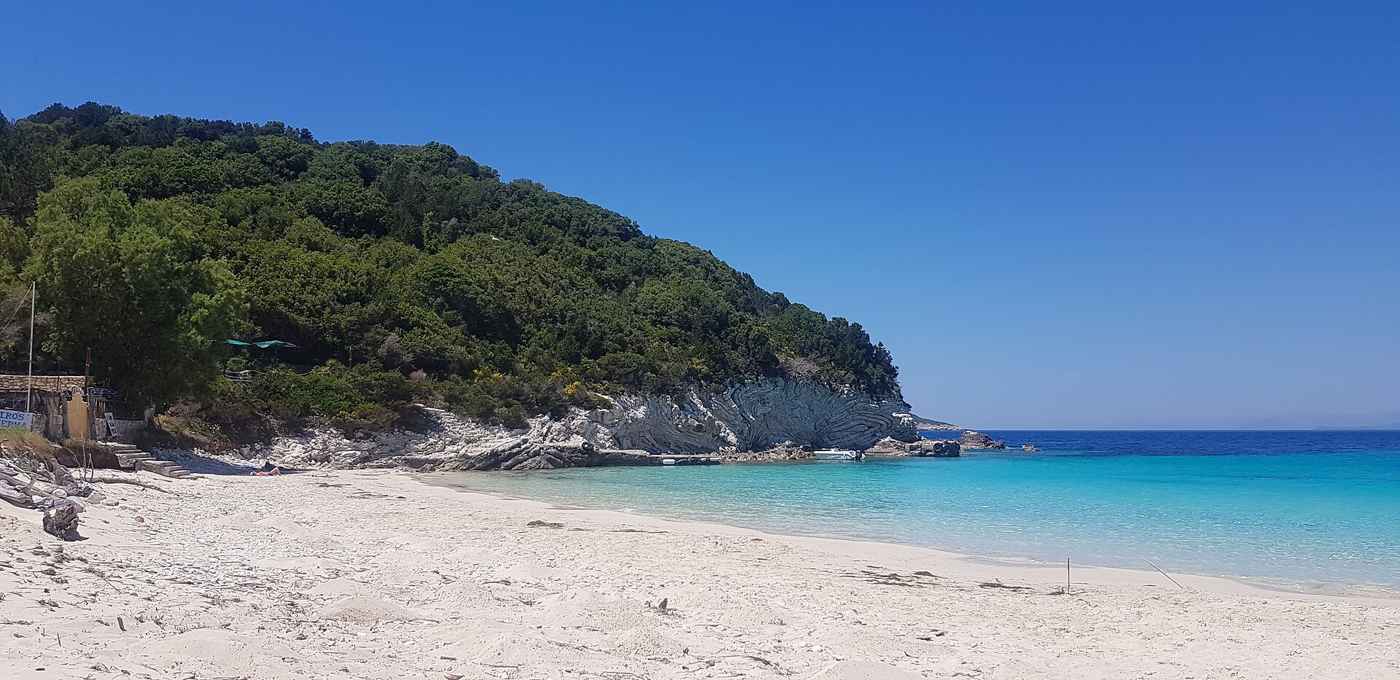 Vrika beach on Antipaxos with white sand and clear turquoise water