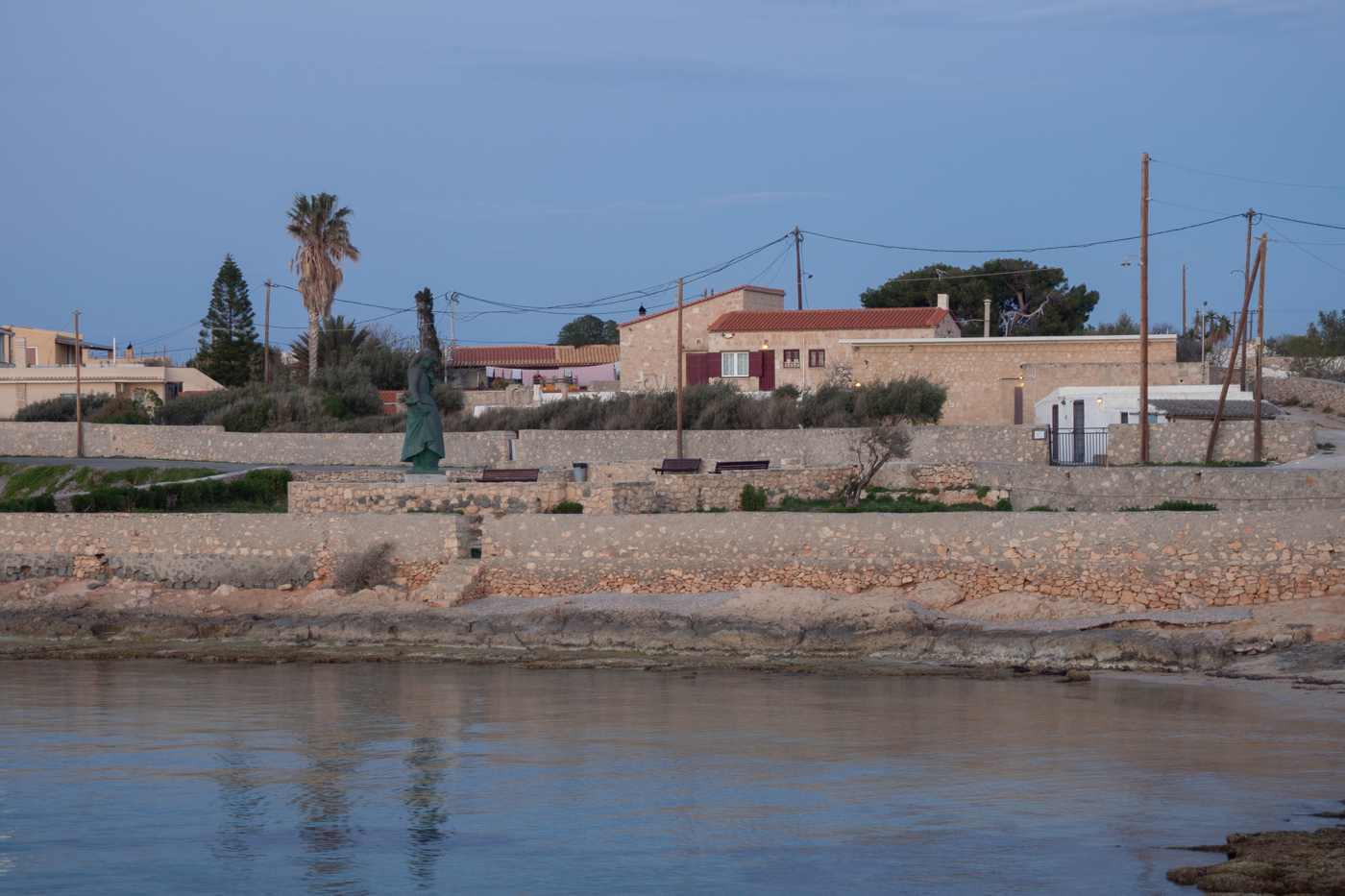 A sculpture by the sea at the Christos Kapralos Museum on the coast of Aegina