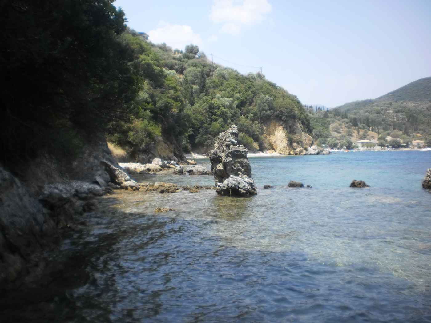 Desimi beach clear turquoise water in its sheltered bay, Lefkada