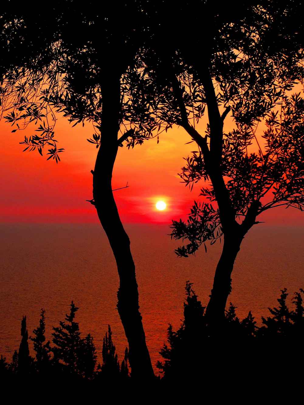 Sunset over the sea and cliffs at Erimitis on Paxos