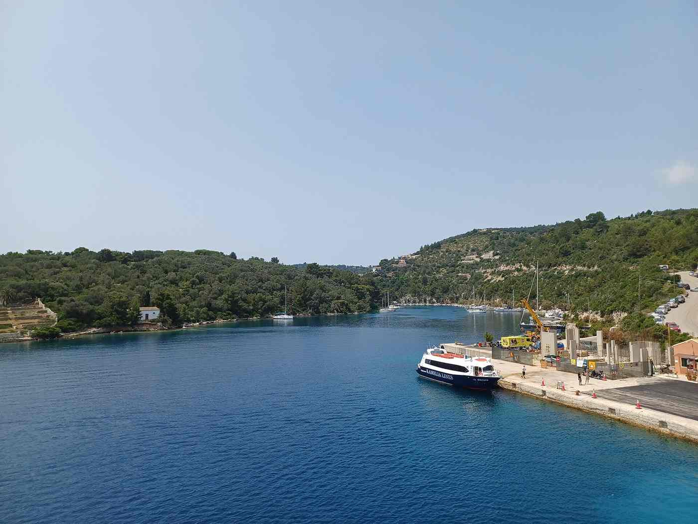 Ferry docked at the port of Gaios on Paxos in its sheltered channel
