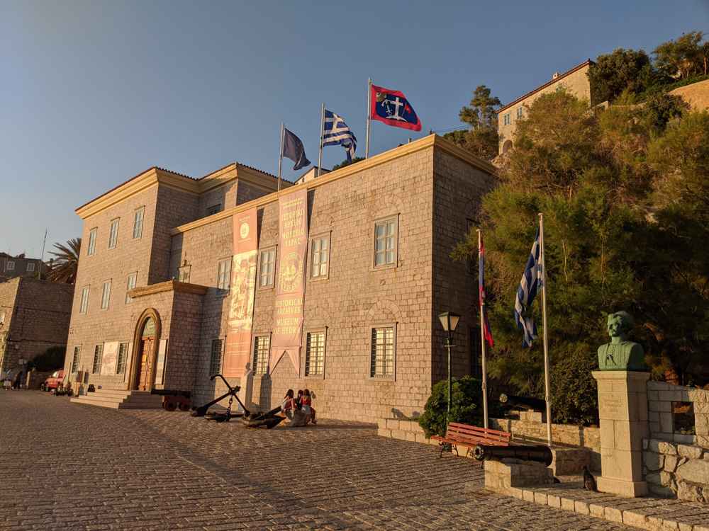 Hydra museums: the Historical Archives Museum, a grand stone building on the harbour