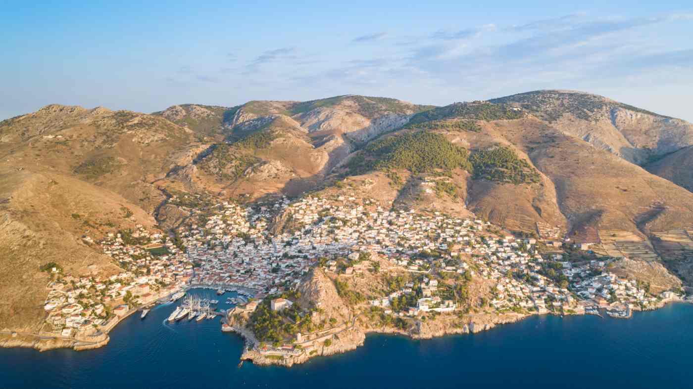 Hydra Town rising around its harbour, the car-free capital of Hydra