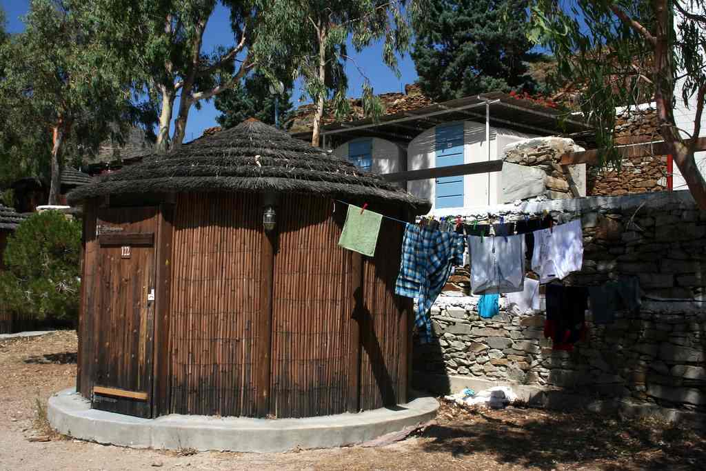 A bamboo-and-thatch camping cabin at Mylopotas on Ios, a favourite with young travellers