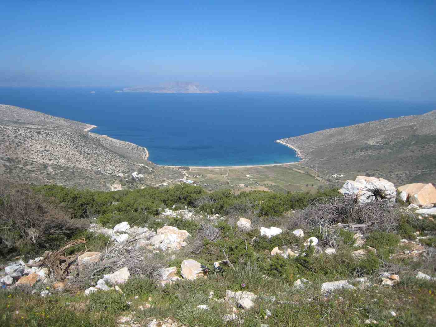 A remote bay on Ios, the kind of scenery reached by hire car, scooter or quad bike
