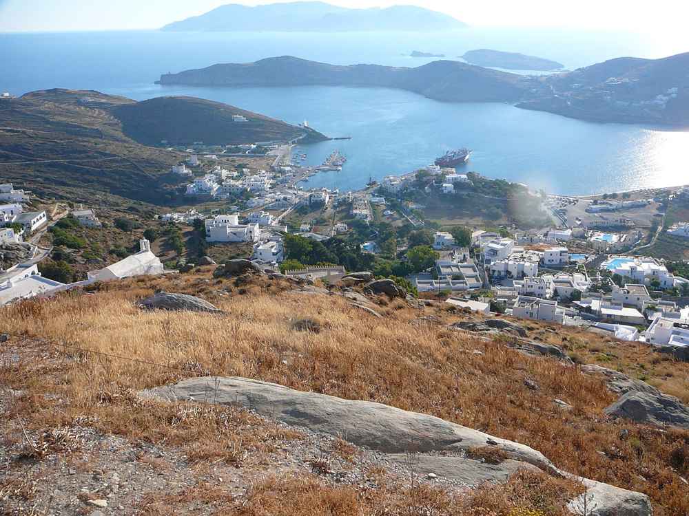 The port of Ios with a ferry, looking across to the island of Sikinos, an easy day trip