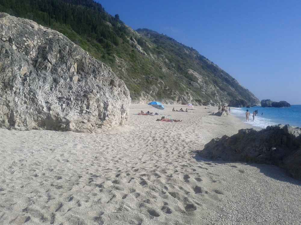 The white sand and boulders of Megali Petra beach near Kalamitsi, Lefkada