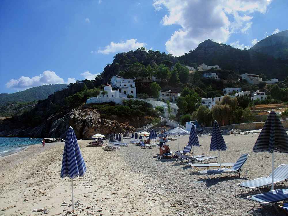 Kyra Panagia beach on Karpathos with its white chapel above the sand