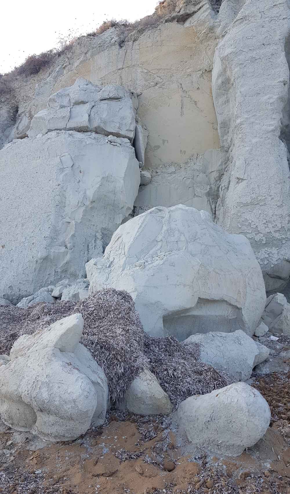 The white-clay cliffs and pebble beach beside Kounopetra, Kefalonia