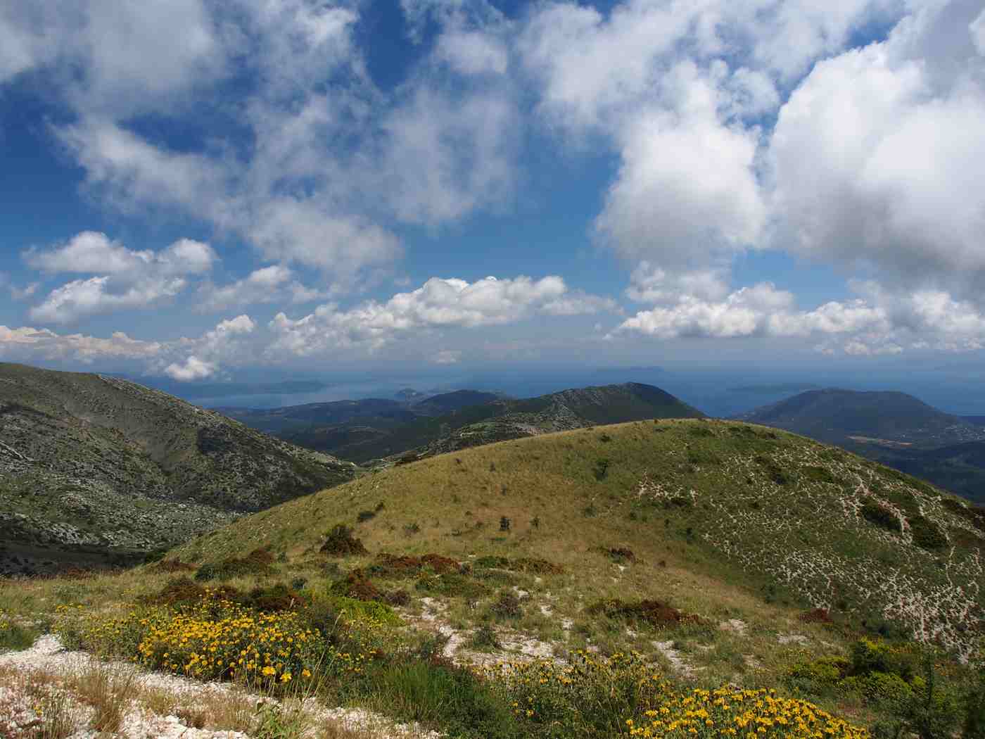 The green hills and winding roads of Lefkada above the Ionian Sea