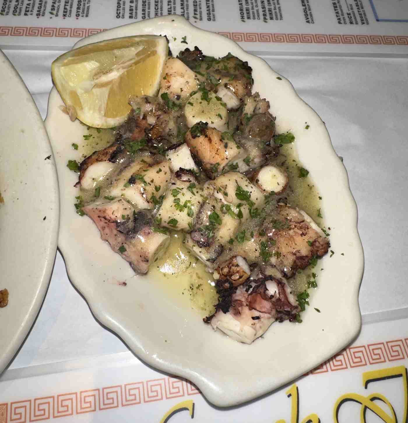 Grilled octopus with olive oil and lemon, a staple of Lefkada food