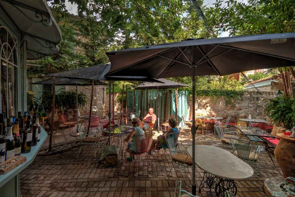 A shaded taverna courtyard in the old town of Lefkada Town