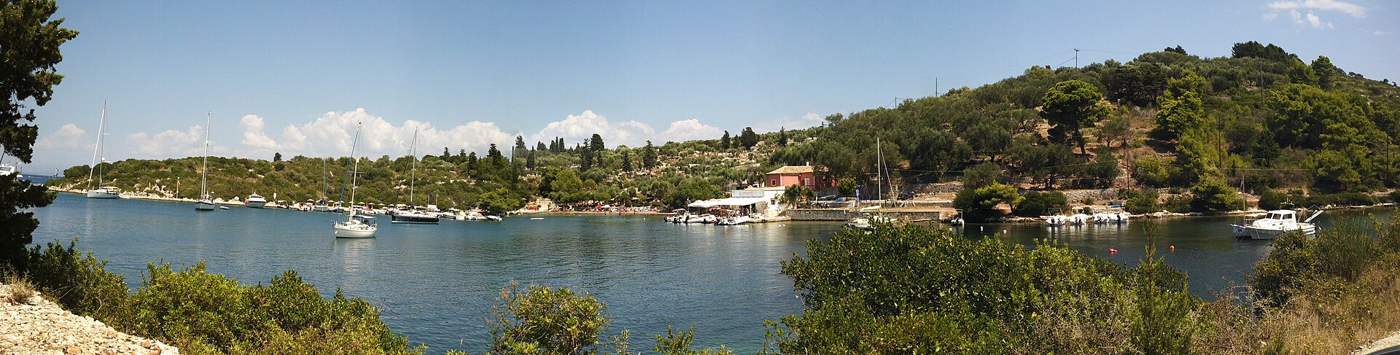 The sheltered bay and islet of Mongonisi at the south of Paxos