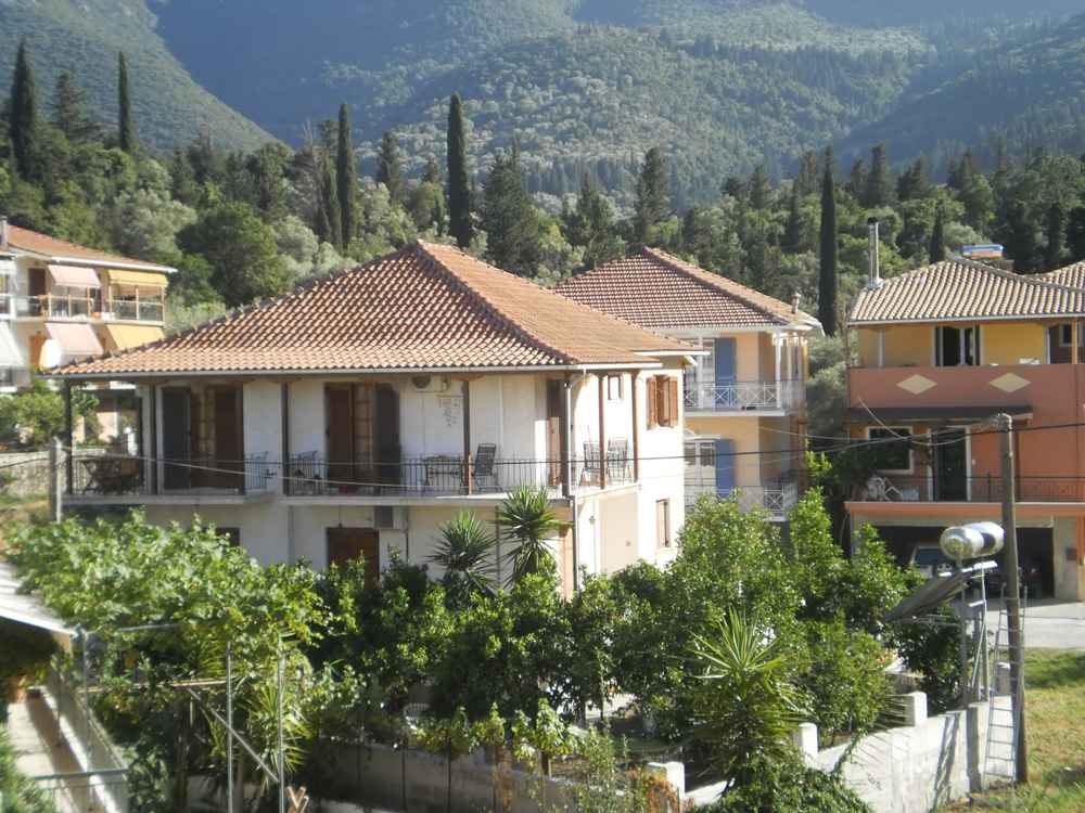 Houses of Nikiana village below the green mountains of Lefkada