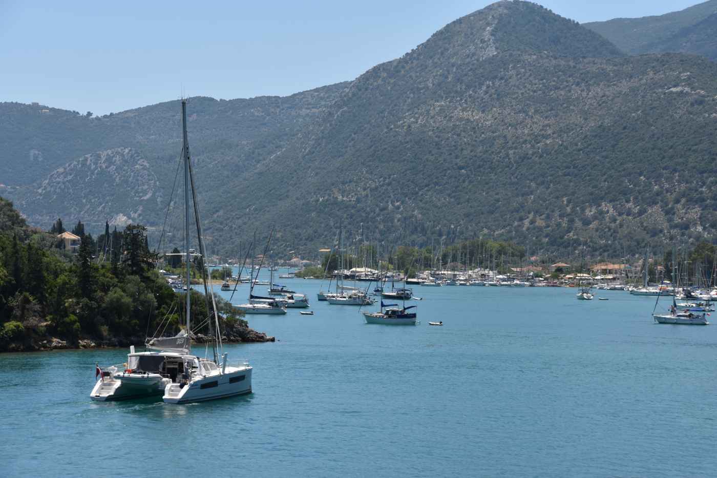 Yachts moored in the sheltered green bay at Nydri, Lefkada