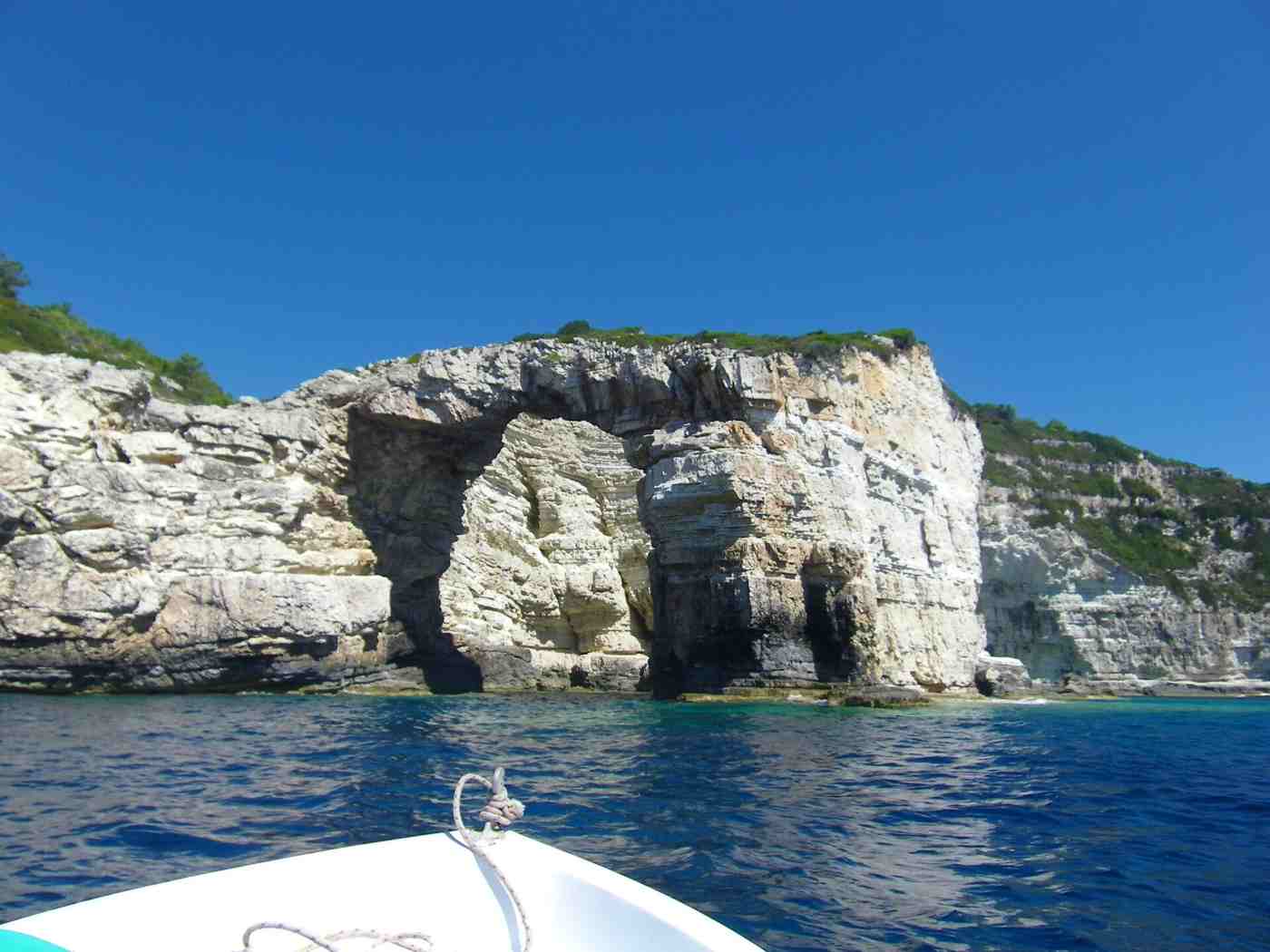 The Tripitos sea arch on the Paxos coast seen from a boat