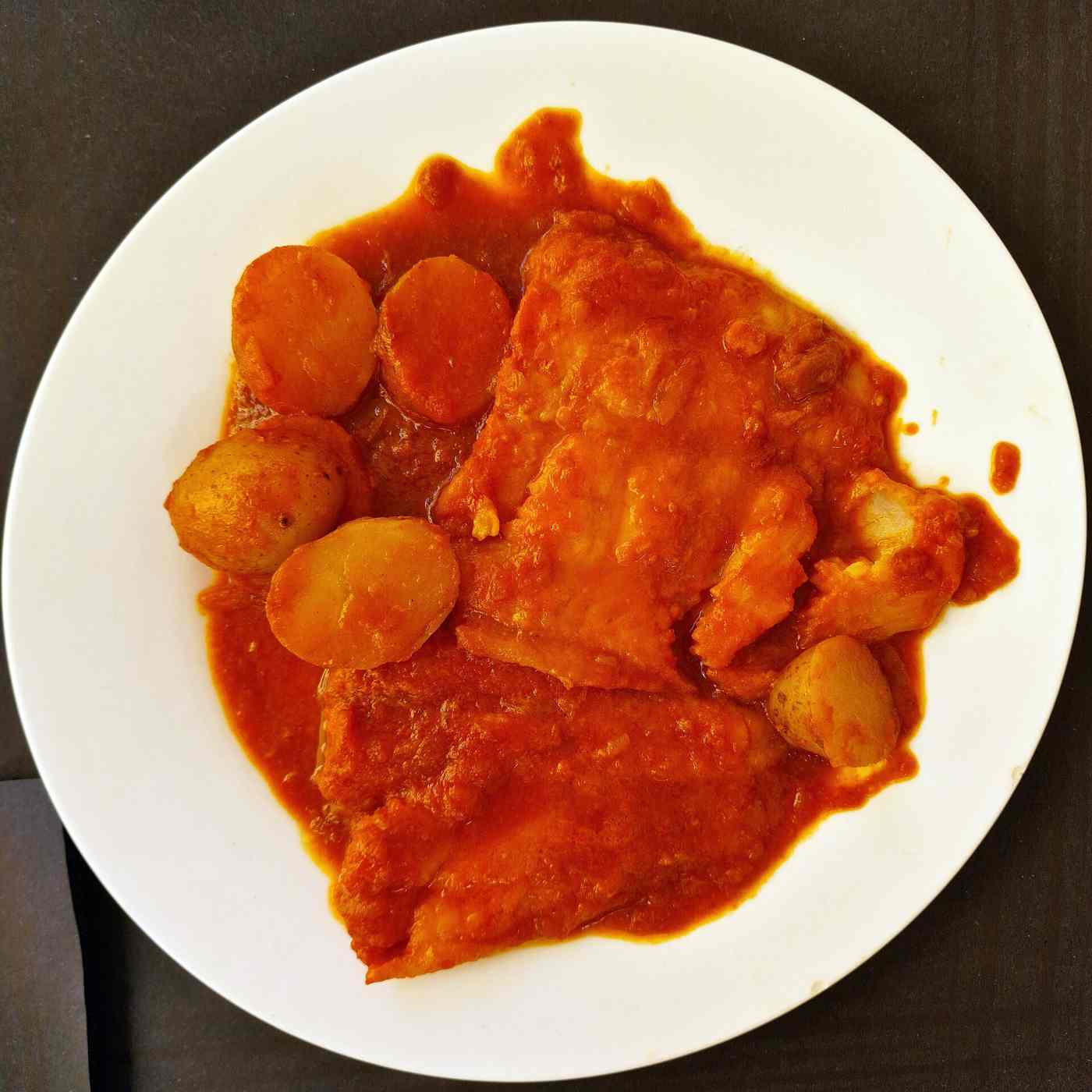 A plate of bourdeto, the spicy Ionian fish stew