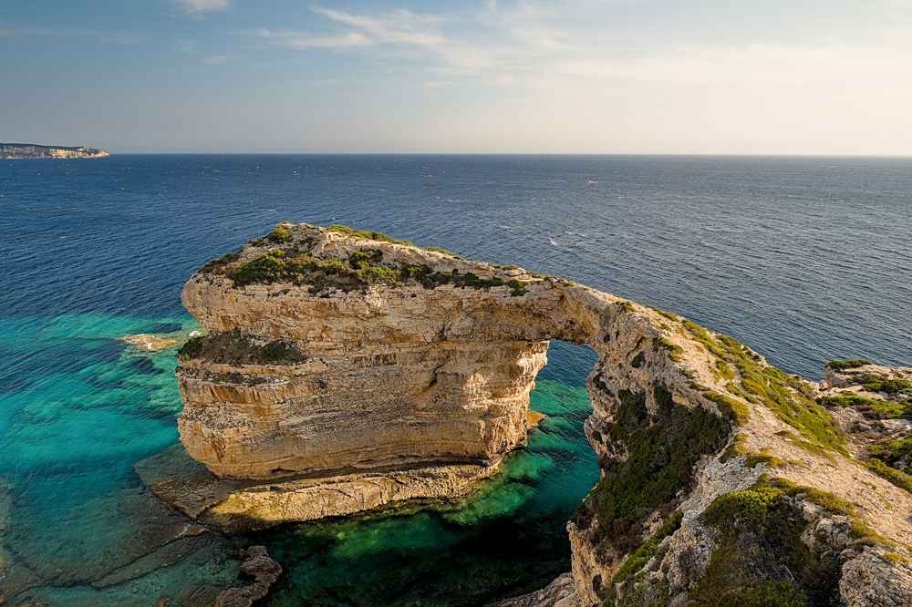 The Tripitos arch, a natural stone bridge on the Paxos coast