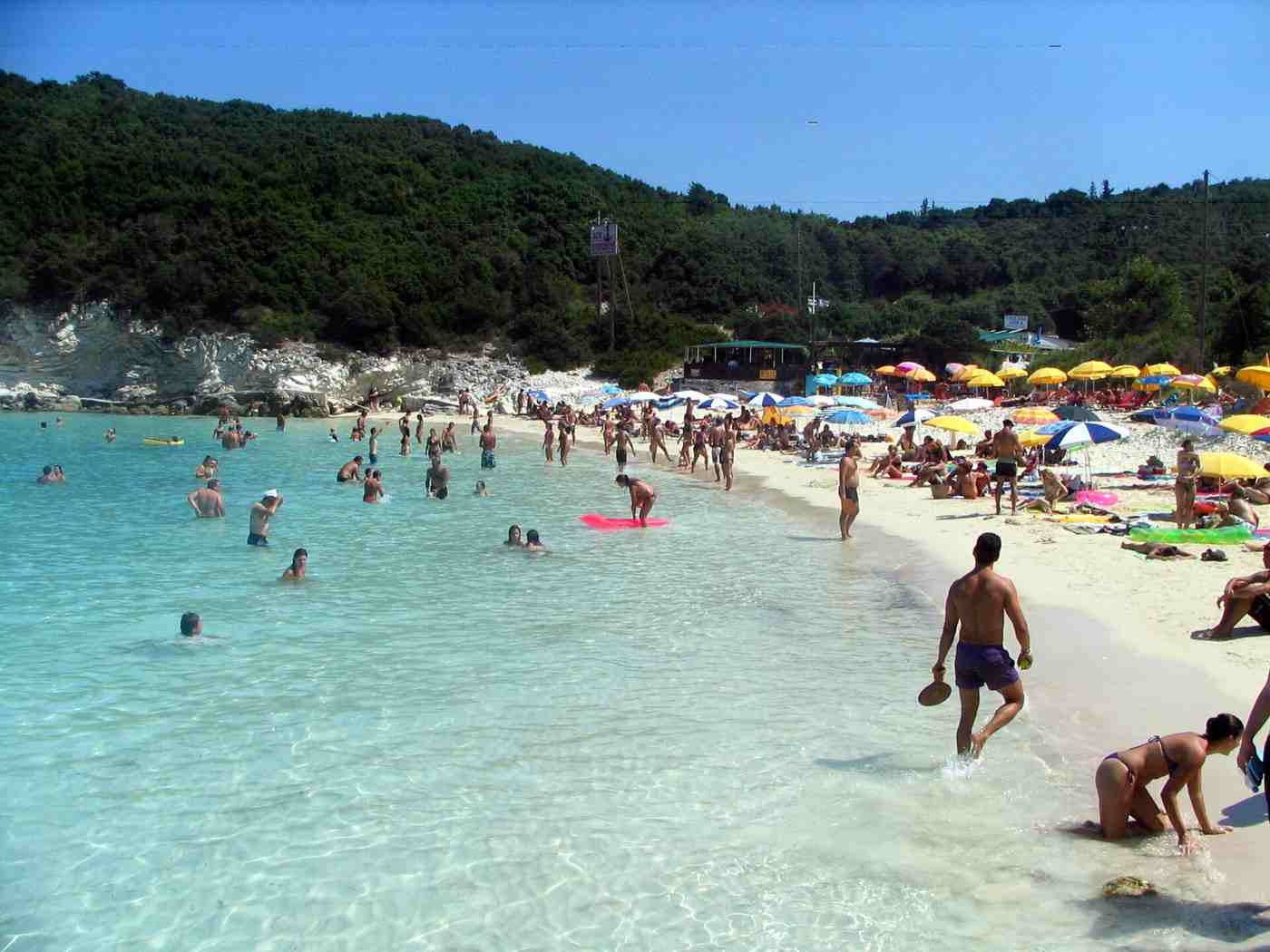 Families at the shallow sandy Vrika beach on Antipaxos near Paxos