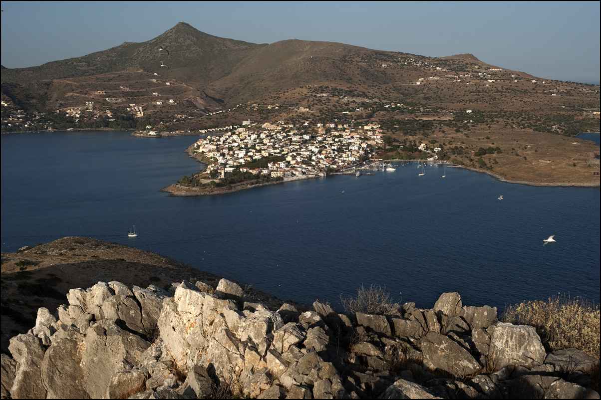 Perdika village and its harbour seen across the water from Moni islet, Aegina