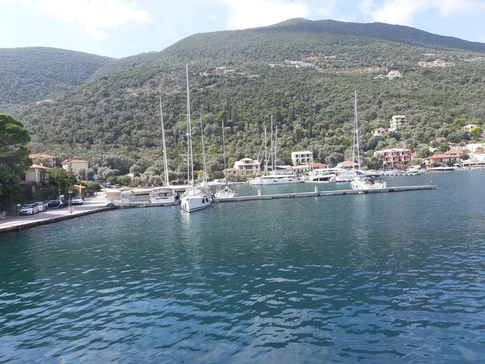 Yachts moored along the waterfront at Sivota bay, Lefkada