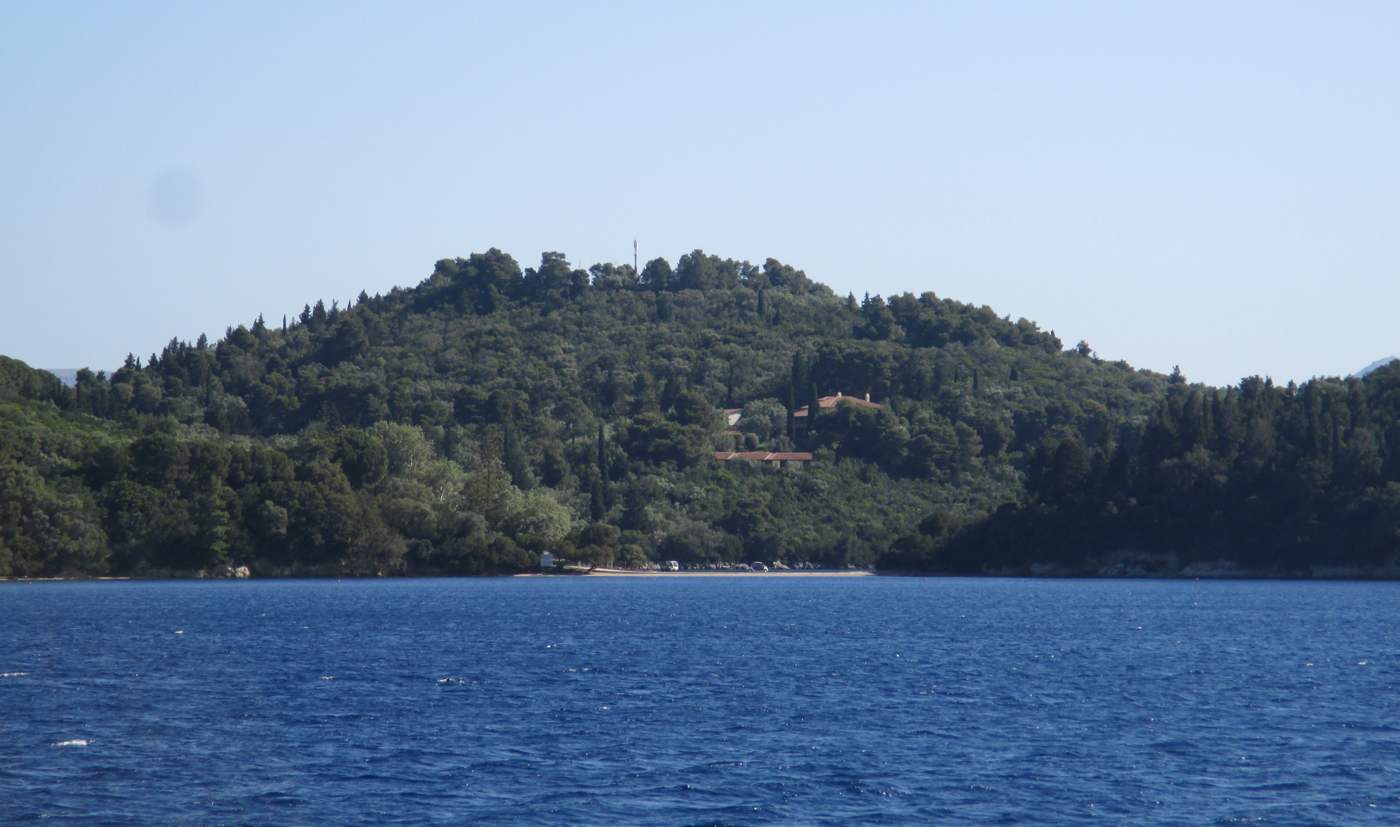 The wooded Skorpios island with the Onassis residence among the trees, Lefkada