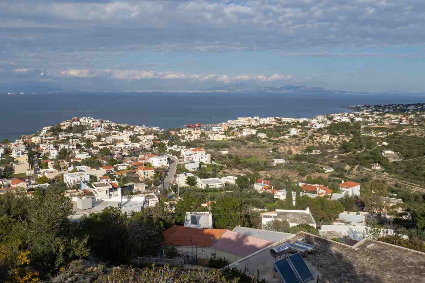 An elevated view over the village and harbour of Souvala on the north coast of Aegina
