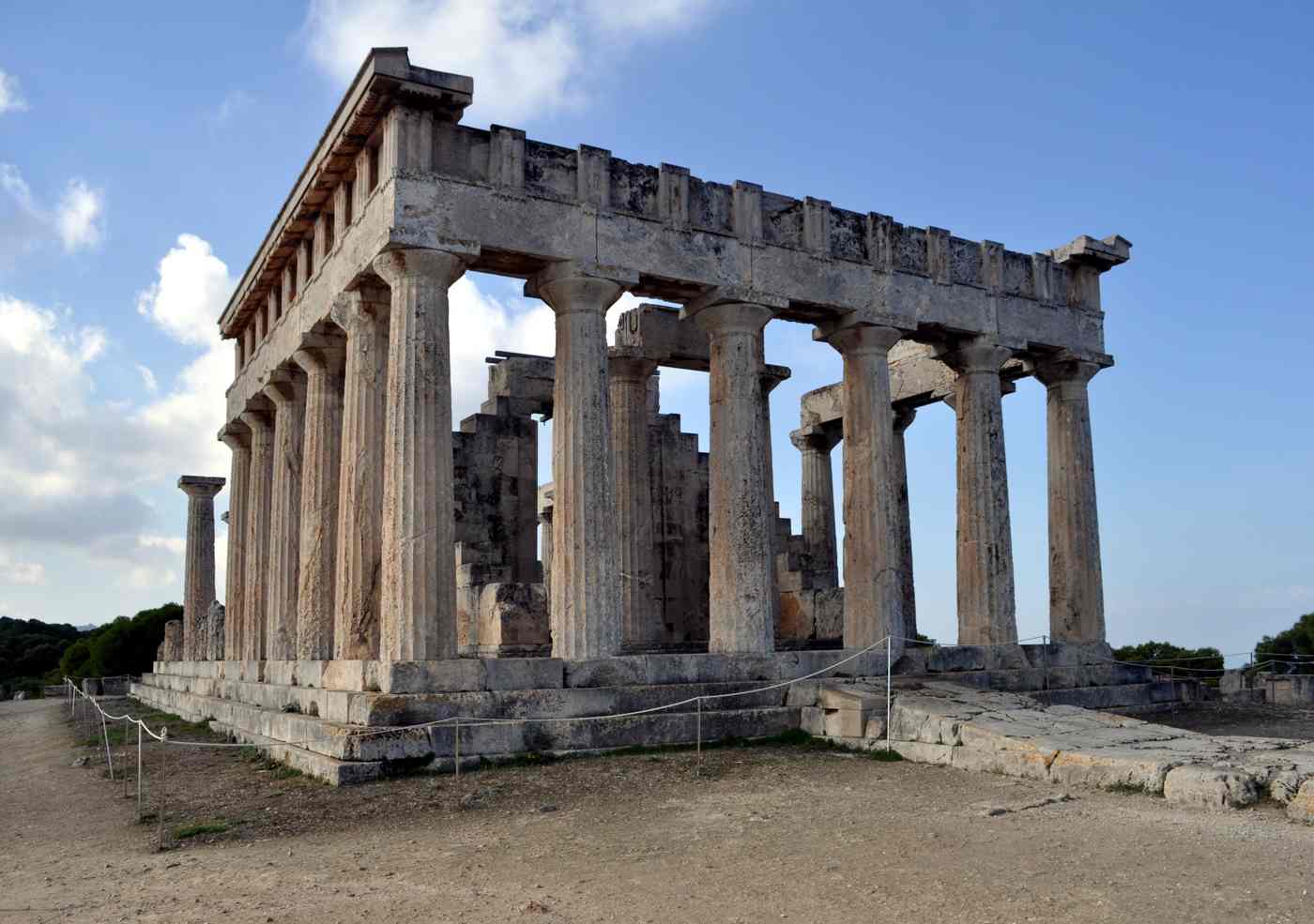 Things to do in Aegina: the ancient Doric Temple of Aphaia standing on its pine-clad hill