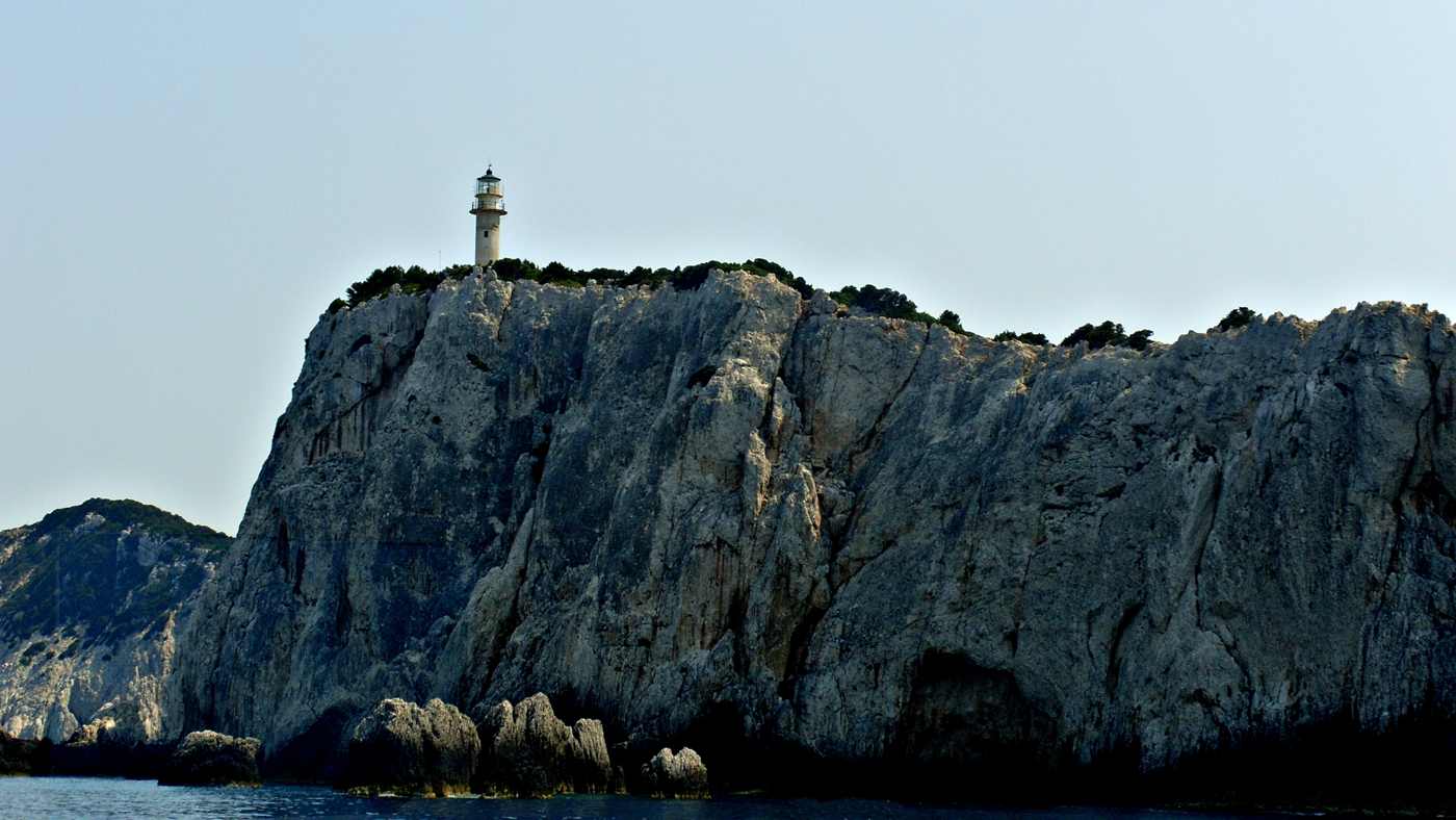 The lighthouse on the cliffs of Cape Lefkatas at the south tip of Lefkada