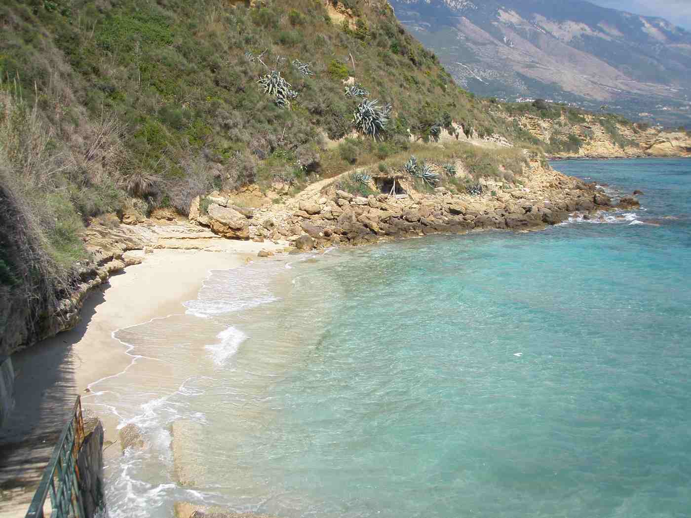 A sandy cove on the green south coast of Kefalonia near Trapezaki and Karavados