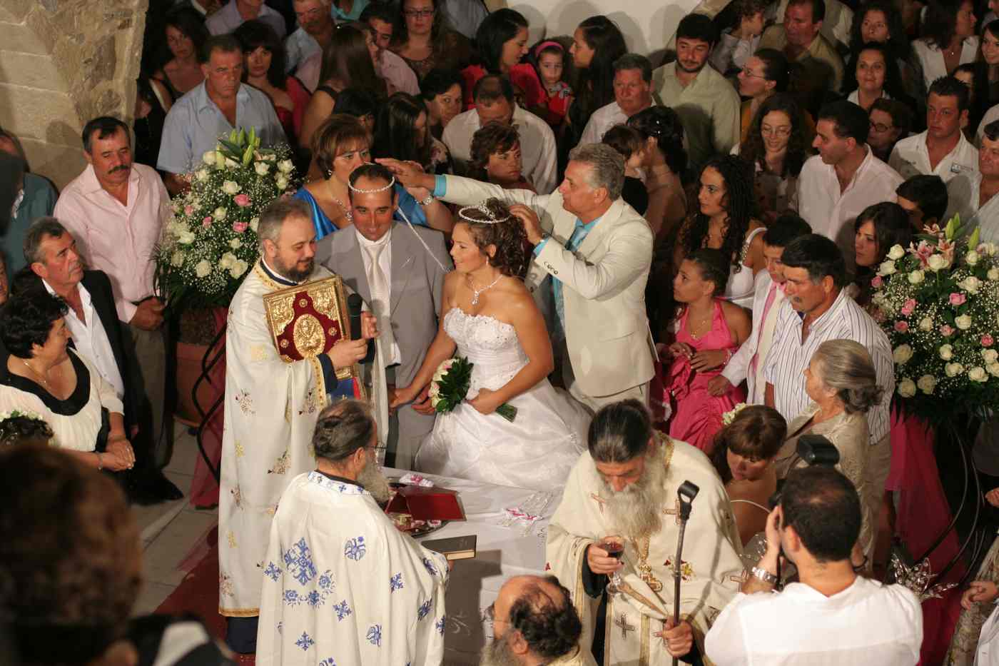 A Greek Orthodox wedding ceremony with the crowning of the couple