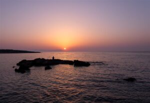 A calm cove on the Akrotiri peninsula near Chania at sunset