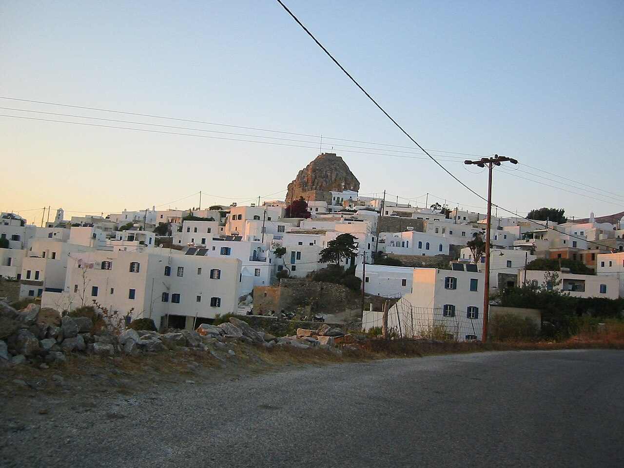 The road climbing to Chora, the capital of Amorgos, beneath its castle rock, on the island's mountain roads