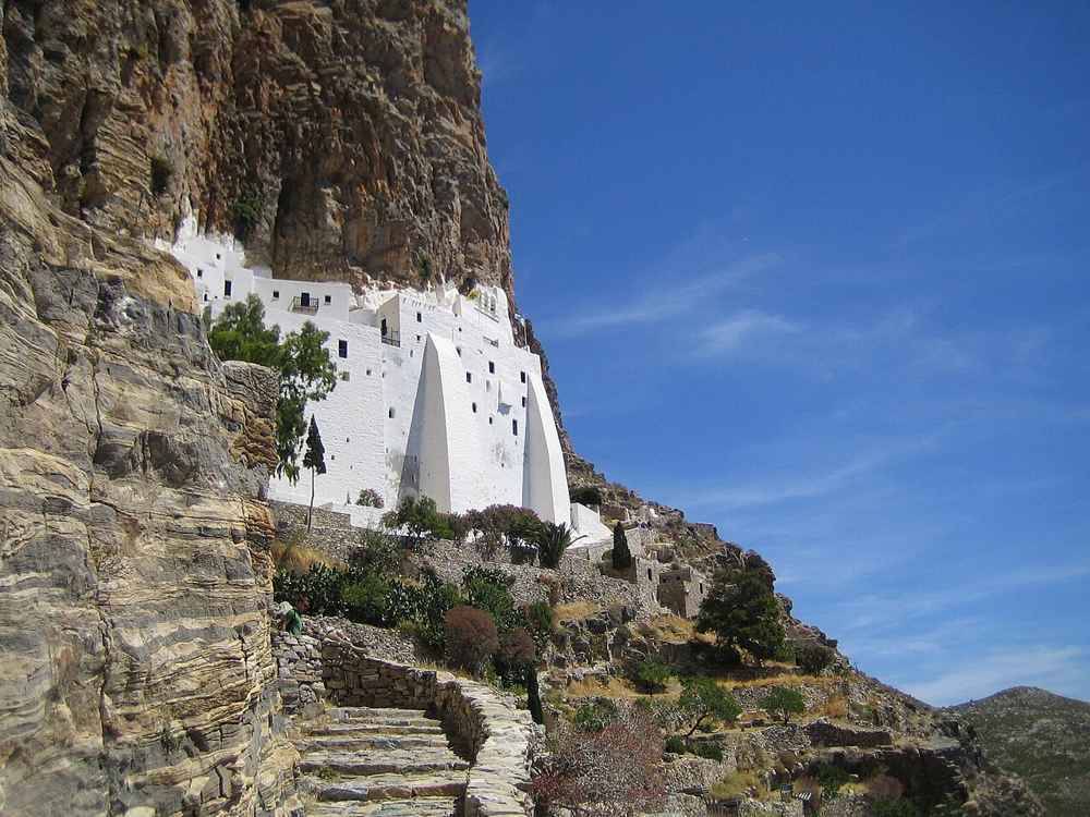 The white Hozoviotissa Monastery and the stone stairway climbing the cliff below Chora on Amorgos