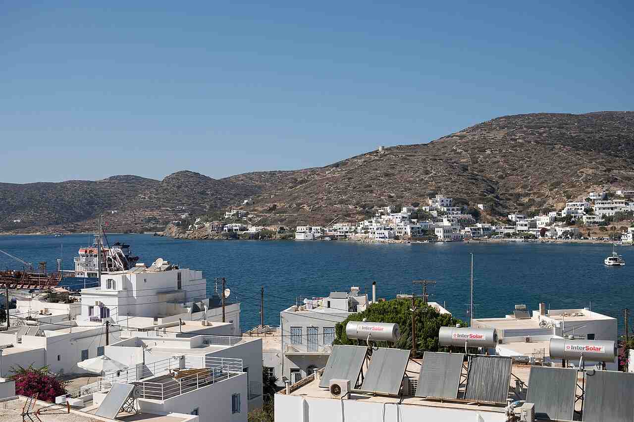 The whitewashed rooftops of Katapola above its sheltered blue bay, the main port of Amorgos