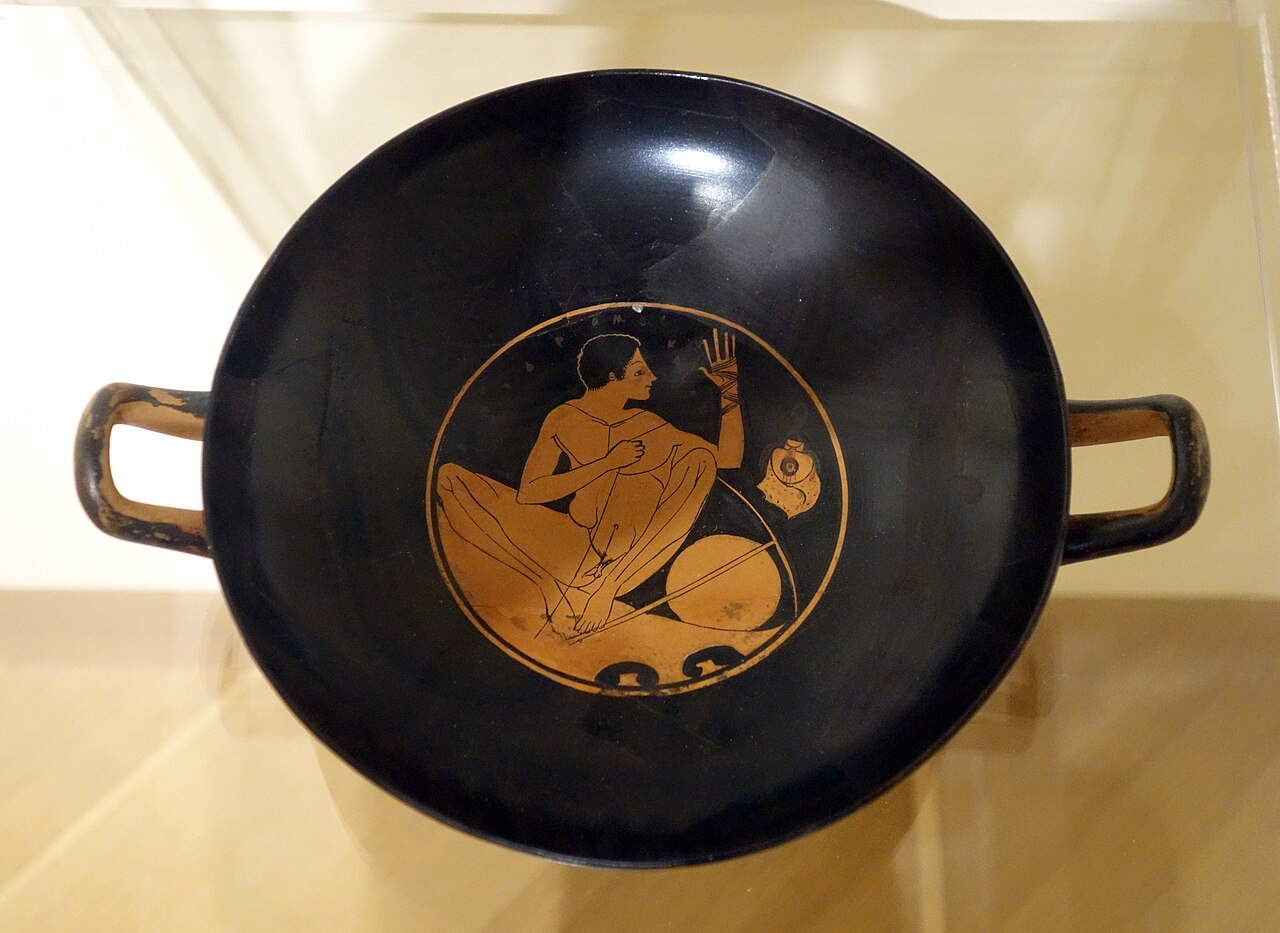 Attic red-figure cup showing a Greek athlete from the era of the ancient Olympic Games