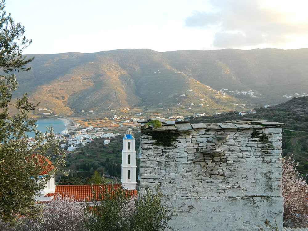 The wide sandy bay and village of Ormos Korthiou in the green south-east of Andros