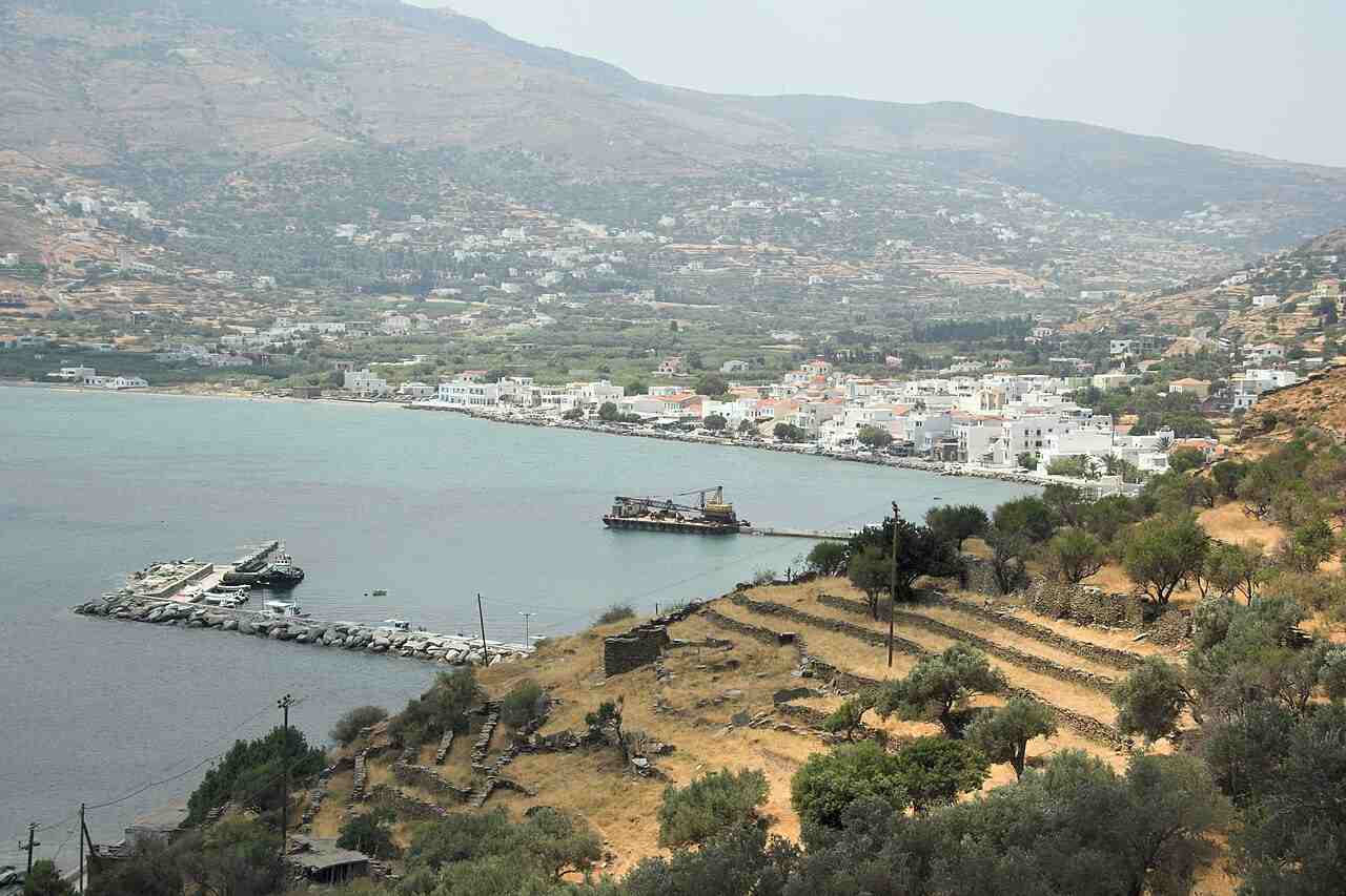 The village of Korthi with its blue-domed church and the bay beyond on the south-east coast of Andros