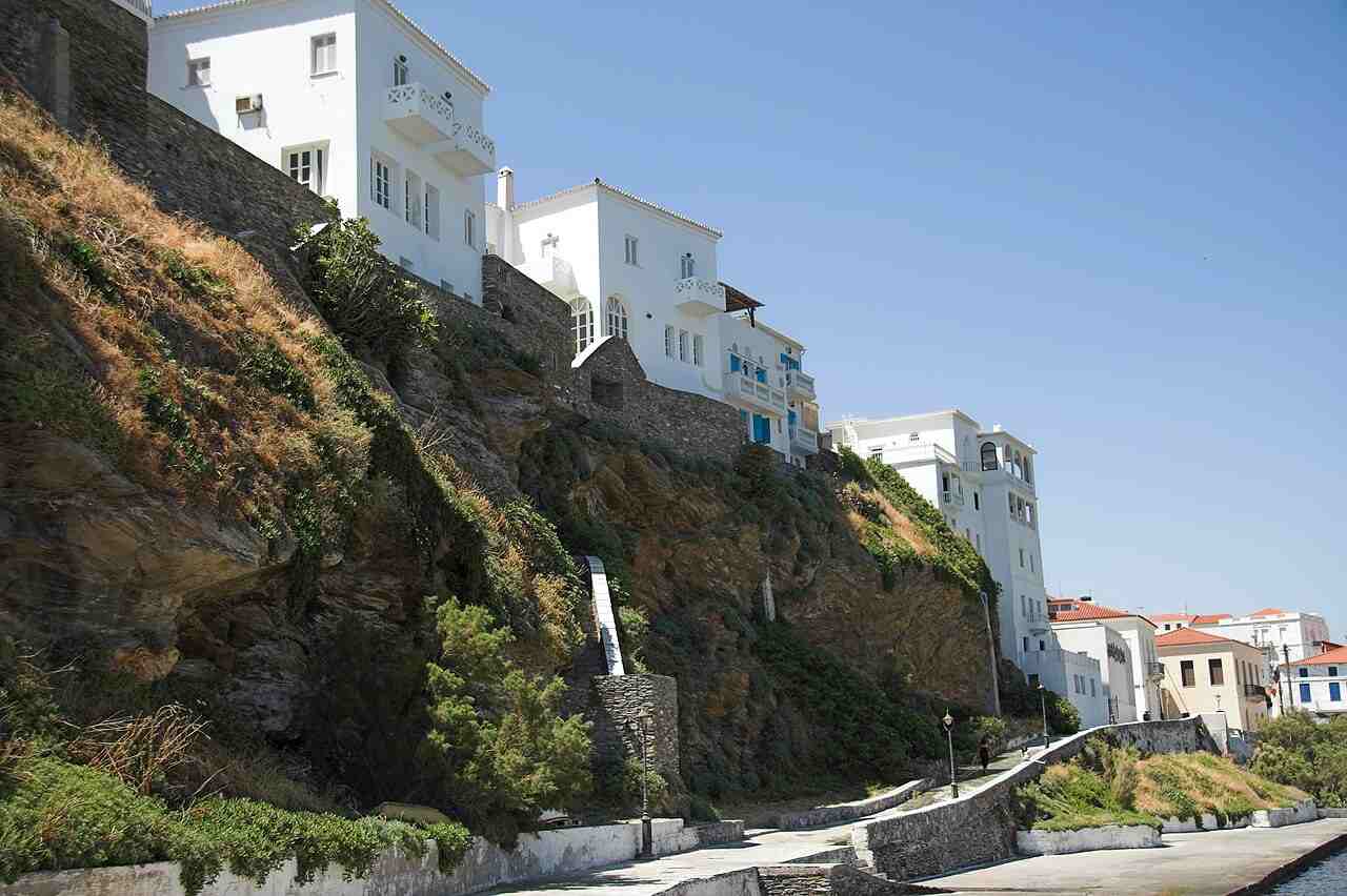 The neoclassical mansions of Chora, the elegant capital of Andros, above the seafront