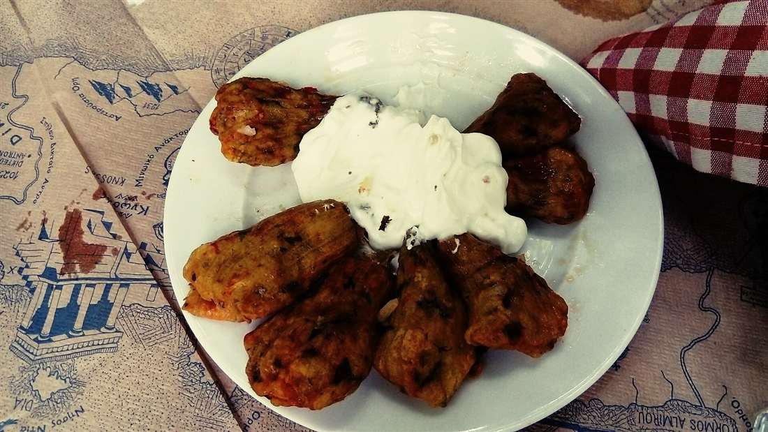 Cretan stuffed courgette flowers and dishes cooked at a Chania cooking class