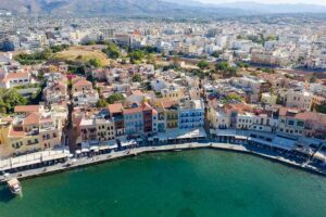 Aerial view of the Chania old town waterfront and its hotels and tavernas