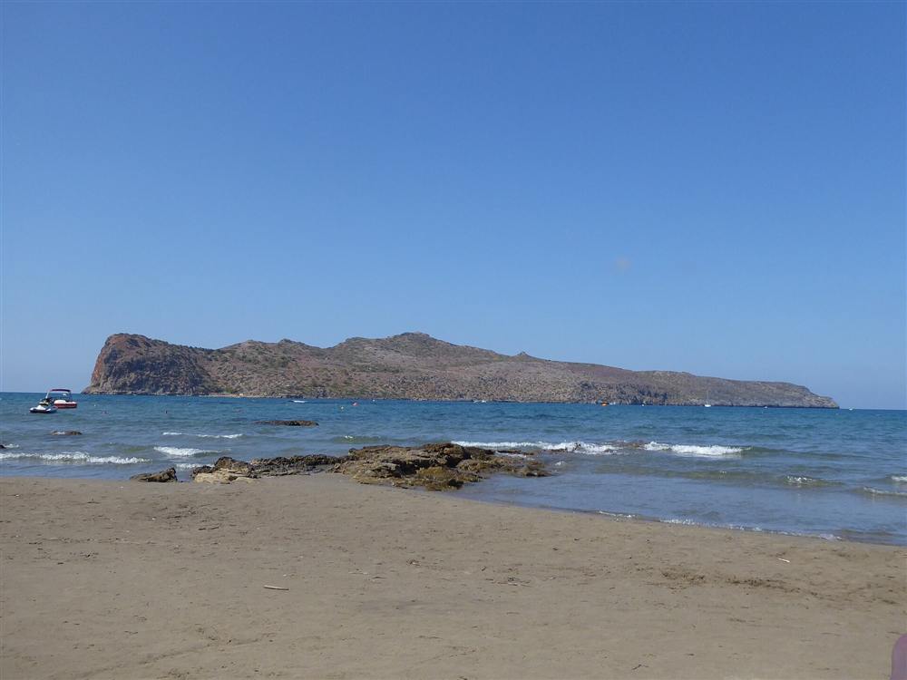The Thodorou islet, a Cretan wild-goat reserve, seen offshore from the beach at Agia Marina near Chania