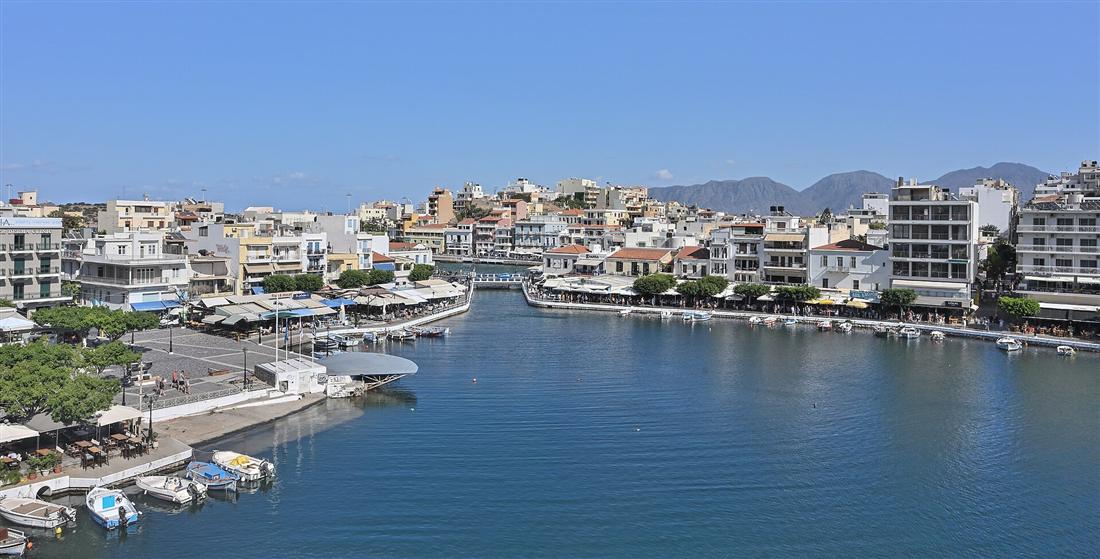The waterfront of Agios Nikolaos, Crete, at the channel between Lake Voulismeni and the harbour