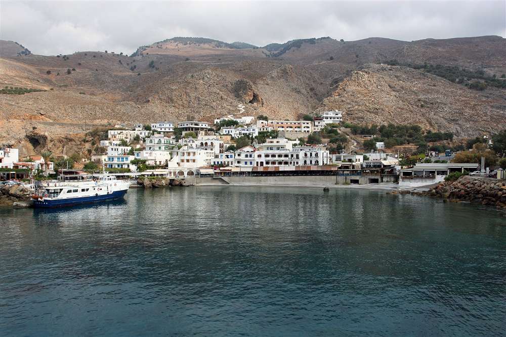 A coastal ferry moored at the harbour of Chora Sfakion, the ferry hub of the Sfakia coast, Crete