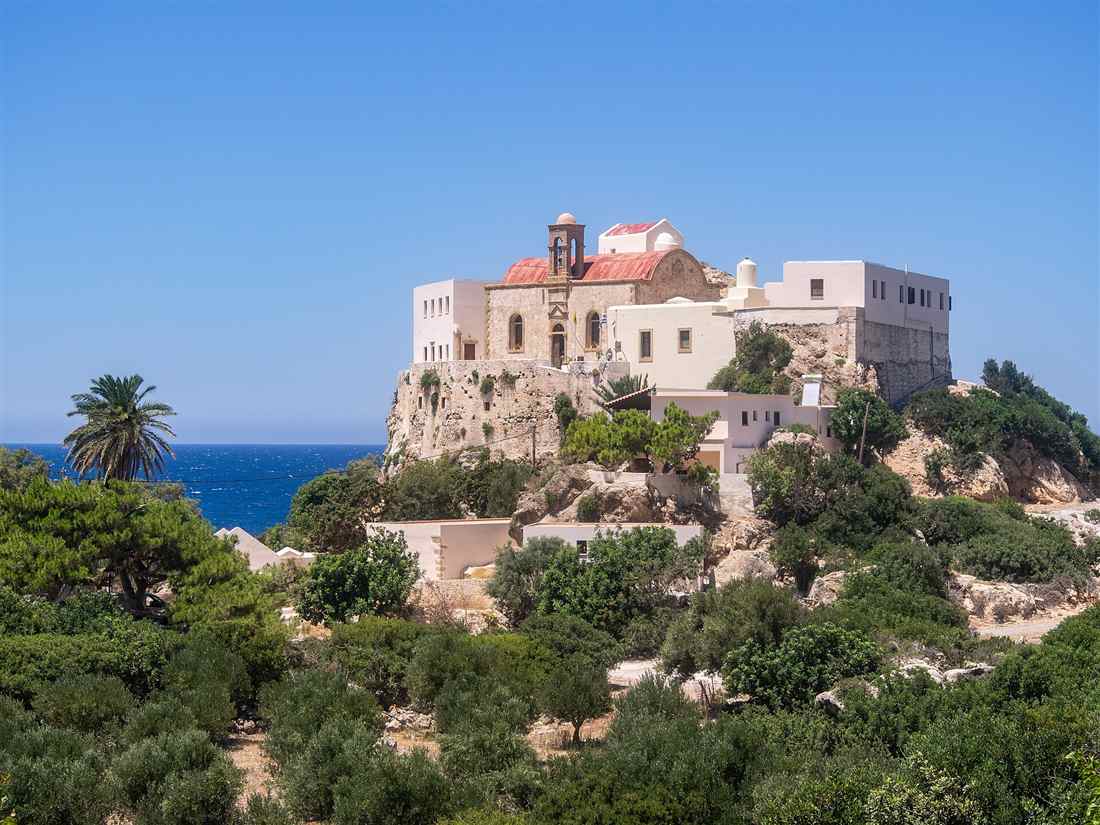 The white Chrysoskalitissa Monastery on its sea rock on the far south-west coast of Crete near Elafonisi