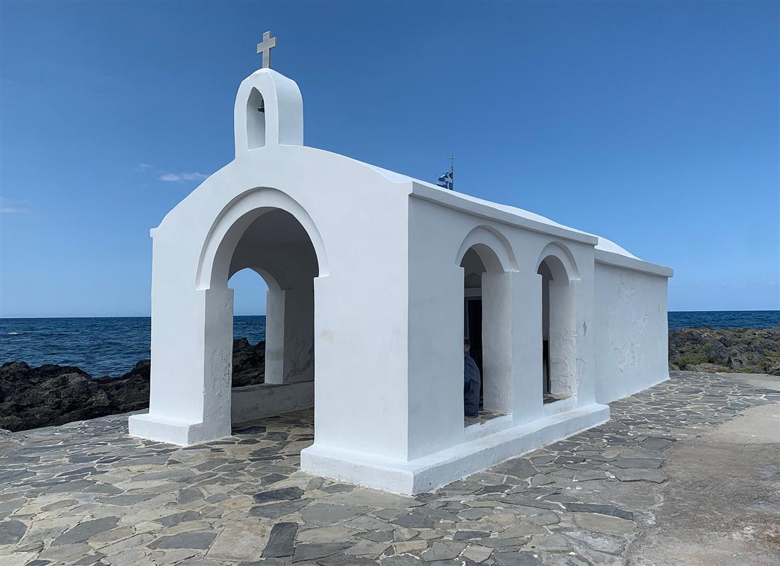 The chapel of Agios Nikolaos on its stone causeway at Georgioupoli, Crete