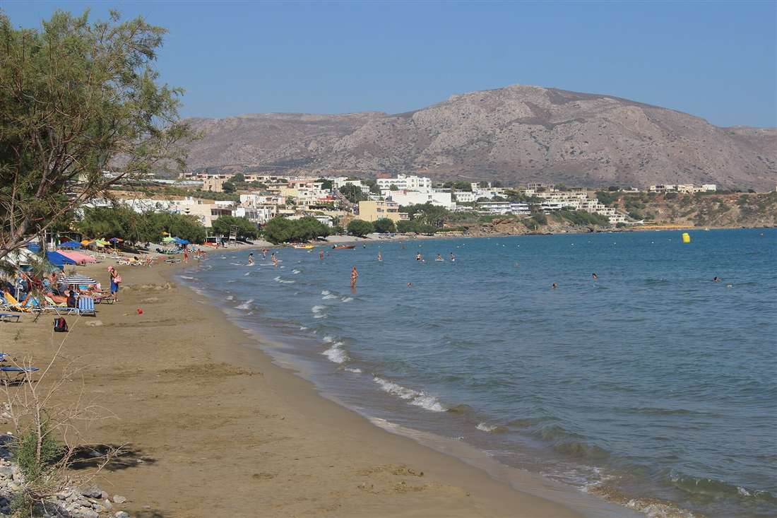 The long shallow sandy beach of Makrigialos on the south-east coast of Crete, backed by the mountains of the Lasithi region